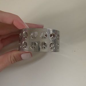 Piece sign silver cuff